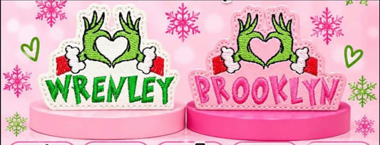 Personalized Grinch clippies shown in white and pink